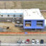 Image of construction site with partially completed building